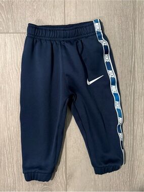 Nike Kids Navy Blue Swoosh Track Pants. 
Boys 12 months
